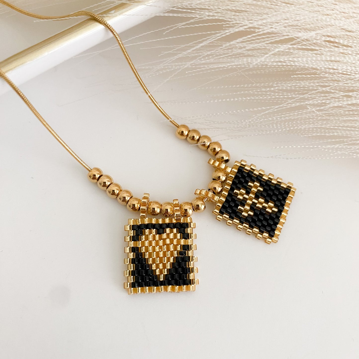 Black and gold scapular