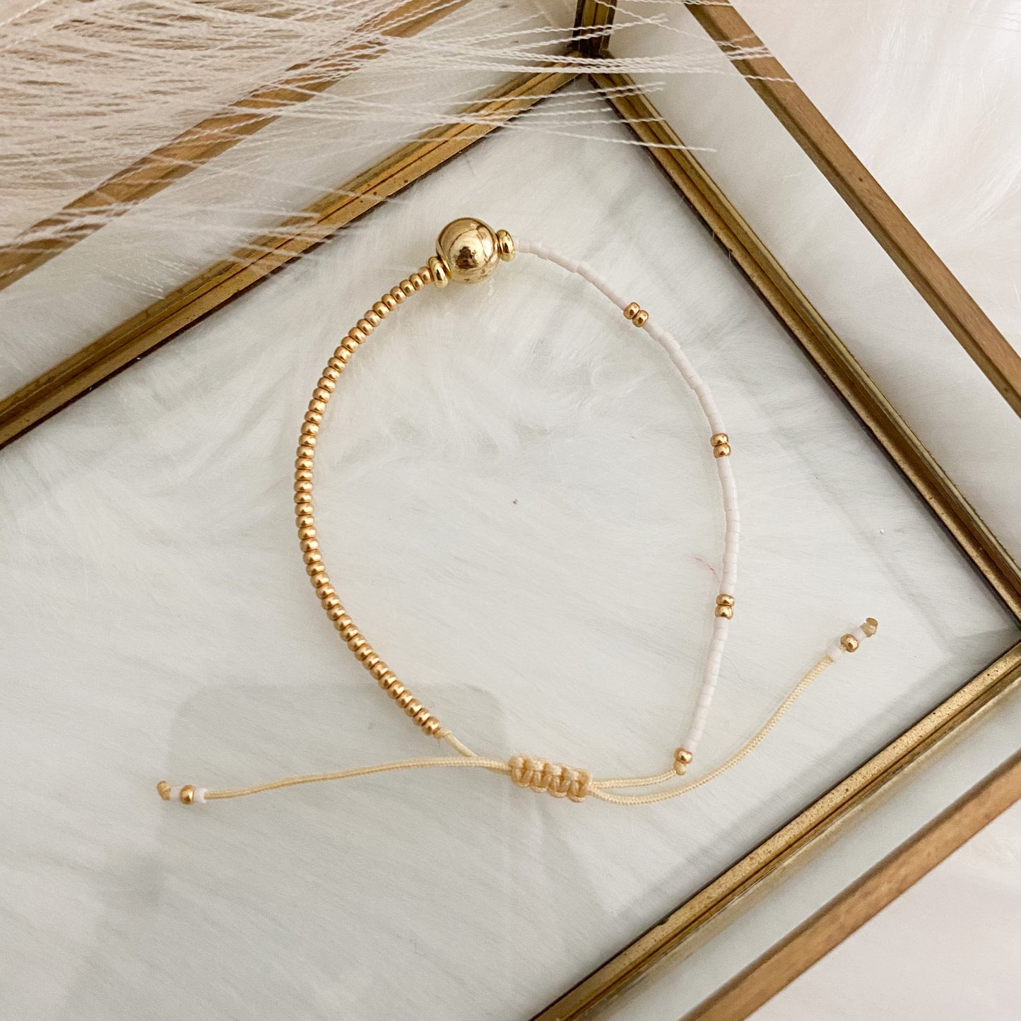 Gold and White Hand Woven Bracelet